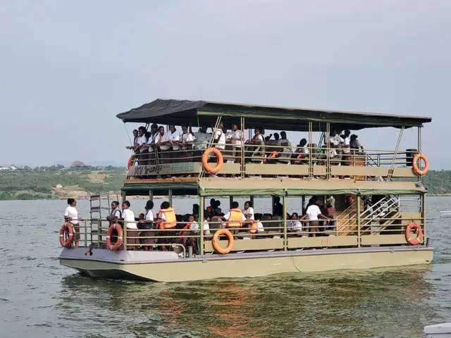 Guests enjoying a boat safari